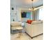Bright living room boasts modern lighting, sleek furniture, and stylish decor at 3191 Paradox Cir # 102, Kissimmee, FL 34746
