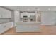 Kitchen island with granite countertops, stainless steel appliances and breakfast bar at 327 Larch Rd, Ocala, FL 34480
