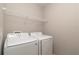Bright laundry room featuring Samsung washer and dryer at 327 Larch Rd, Ocala, FL 34480