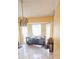 Neutral tone dining area with chandelier and tile floors at 4719 Miranda Cir, Orlando, FL 32818