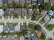 Aerial view of the property highlighting its location on a tree-lined street within a quiet residential neighborhood at 478 N Sundance Dr, Lake Mary, FL 32746