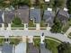 Aerial view of the property highlighting its location on a tree-lined street within a quiet residential neighborhood at 478 N Sundance Dr, Lake Mary, FL 32746