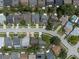 Aerial view of the property highlighting its location on a tree-lined street within a quiet residential neighborhood at 478 N Sundance Dr, Lake Mary, FL 32746