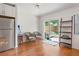 Living room featuring hardwood floors, stainless steel appliances, and patio access with natural light at 478 N Sundance Dr, Lake Mary, FL 32746