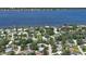 Aerial view displays property and the waterfront community located near the river at 60 Palmetto Dr, Ormond Beach, FL 32176