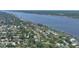 Aerial view of the neighborhood and property with easy access to the waterway with private residential docks at 60 Palmetto Dr, Ormond Beach, FL 32176