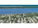 Aerial view displays property and the waterfront community located near the river at 60 Palmetto Dr, Ormond Beach, FL 32176