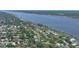 Aerial view of the coastal neighborhood with easy access to the waterway with private residential docks at 60 Palmetto Dr, Ormond Beach, FL 32176