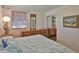 Bedroom with wood floors, full dresser, and natural light at 60 Palmetto Dr, Ormond Beach, FL 32176