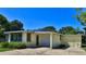 Charming single-story home features a convenient attached garage and well-maintained landscaping at 60 Palmetto Dr, Ormond Beach, FL 32176