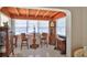 Charming seating area featuring elegant furniture and decor, bathed in natural light at 60 Palmetto Dr, Ormond Beach, FL 32176