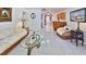 Spacious living room with tile floors and a seamless transition to the kitchen at 60 Palmetto Dr, Ormond Beach, FL 32176