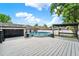 Above ground pool and deck in the backyard with shade cabana at 679 N Endeavour Dr, Winter Springs, FL 32708