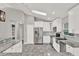 Well-equipped kitchen featuring stainless steel appliances and granite countertops at 679 N Endeavour Dr, Winter Springs, FL 32708