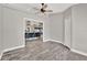 Living area offers tile flooring and seamless transition into the kitchen and dining area at 679 N Endeavour Dr, Winter Springs, FL 32708