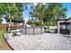 Above ground pool with deck, pool equipment, and rock landscaping at 679 N Endeavour Dr, Winter Springs, FL 32708