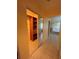 Walk-in closet with mirrored doors is adjacent to the Primary bathroom, offering extra storage at 7011 Archwood Dr, Orlando, FL 32819