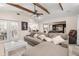 Spacious living room with hardwood floors and modern furnishings at 7011 Archwood Dr, Orlando, FL 32819