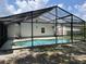 Screen enclosed in-ground pool for outdoor enjoyment and relaxation at 7011 Archwood Dr, Orlando, FL 32819