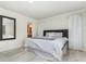 Serene bedroom featuring a comfortable bed and neutral decor at 7205 June Bug Ln, Orlando, FL 32818
