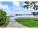 Scenic view of the lake showing condos on the horizon from community boat ramp at 8143 Terragona Ct, Orlando, FL 32836