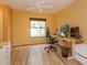 Bright office with hardwood floors, natural light, a ceiling fan, and modern furniture at 8143 Terragona Ct, Orlando, FL 32836