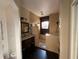 This primary bathroom features a modern vanity and a luxurious tile shower with a window at 932 S Lake Sterling Ct, Casselberry, FL 32707