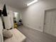 Flex room with mirrored wall and large open space. Can be used as gym, playroom or home office at 932 S Lake Sterling Ct, Casselberry, FL 32707