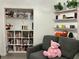 Nicely decorated living room area, with shelves and a closet for storage at 932 S Lake Sterling Ct, Casselberry, FL 32707