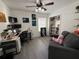 Comfortable office with work station, gray sofa, and large storage closet at 932 S Lake Sterling Ct, Casselberry, FL 32707