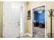 Welcoming foyer with tiled flooring and view into a carpeted office space at 969 Springs Landing Dr, Deltona, FL 32725