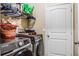 Modern laundry room with a front-load washer and dryer, providing convenience and efficiency at 969 Springs Landing Dr, Deltona, FL 32725