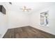Bright bedroom with wood floors, a ceiling fan, and a large window at 1000 Chesterfield Cir, Winter Springs, FL 32708