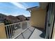 Private balcony overlooking a serene neighborhood street offers a relaxing outdoor space at 12106 Poppy Field Ln # 107, Orlando, FL 32837