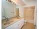 Bathroom with double sink vanity, bathtub, and shower at 12106 Poppy Field Ln # 107, Orlando, FL 32837