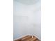 Walk-in closet featuring multiple shelves and hardwood floors at 12106 Poppy Field Ln # 107, Orlando, FL 32837