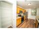 Bright kitchen with stainless steel appliances and pantry view at 12106 Poppy Field Ln # 107, Orlando, FL 32837