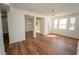 Bright living room with hardwood floors, and ample natural light, perfect for relaxation and entertainment at 12106 Poppy Field Ln # 107, Orlando, FL 32837