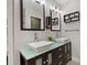 Bathroom featuring double sink vanity with modern fixtures and decor at 126 Duncan Trl, Longwood, FL 32779