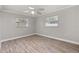 Spacious, bright bedroom featuring laminate flooring and ample natural light at 126 Duncan Trl, Longwood, FL 32779