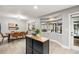 Open dining area with ample windows providing a view of the screened-in lanai and pool at 126 Duncan Trl, Longwood, FL 32779