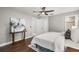 Comfortable main bedroom featuring ceiling fan, wood floors, and ample natural light at 126 Duncan Trl, Longwood, FL 32779