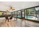 Relaxing enclosed pool area with comfortable seating and a view of the pool at 126 Duncan Trl, Longwood, FL 32779
