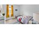 Cozy bedroom with bright natural light, hardwood floors, and modern accents at 13227 Spring Grove Way, Winter Garden, FL 34787