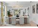 Dining room features modern lighting, open layout to living area with access to outdoor patio at 13227 Spring Grove Way, Winter Garden, FL 34787