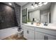 Modern bathroom with double vanity, walk-in shower, and stylish decor at 1341 Lumpini St, St Cloud, FL 34771