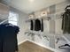 Well-organized walk-in closet with ample hanging space and shelving at 1341 Lumpini St, St Cloud, FL 34771