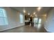 Bright and spacious living area featuring hardwood flooring and an open floor plan concept at 1354 Twelve Oaks Rd, St Cloud, FL 34771