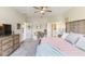Spacious bedroom featuring a comfortable bed and ample natural light at 1382 Foltz Loop, Oakland, FL 34787