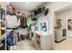 Organized walk-in closet with shelving, drawers, and a vanity area at 1382 Foltz Loop, Oakland, FL 34787